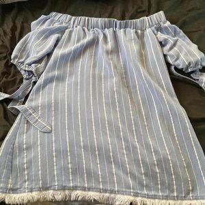 I am selling this blue and white off the shoulder  Dress it is a Large